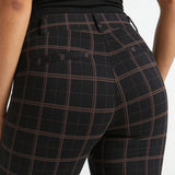 Close-up three-quarter back view of Black Brown Plaid Dress Pant Yoga Pants showing the waistband, belt loops and faux welt pocket