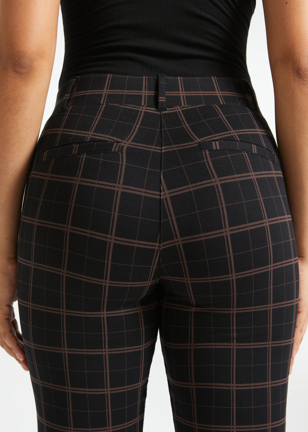 Close-up rear view of Black Brown Plaid Dress Pant Yoga Pants showing the tailored seaming, belt loops and faux welt pockets