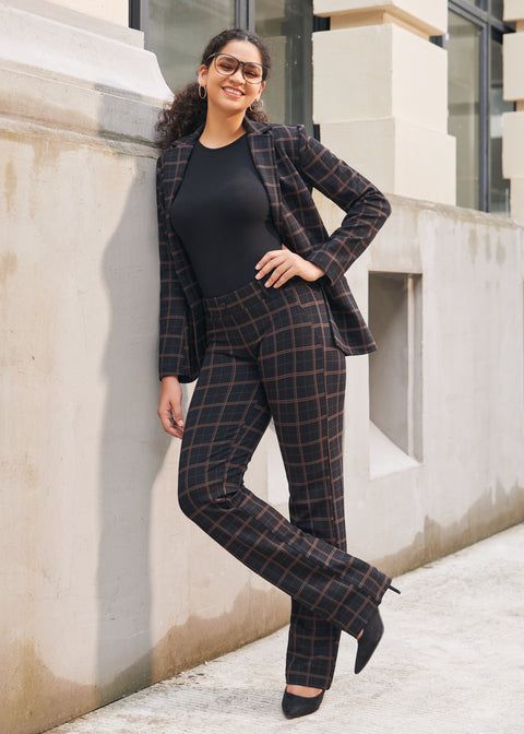 Woman wearing matching Black Brown Plaid straight-leg pants and Classic Blazer with a black top and heels outdoors