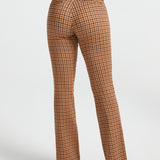Full back view of woman wearing Camel Mini Houndstooth straight-leg Dress Pant Yoga Pants showing the fit through the hips and legs
