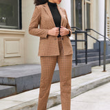 Woman wearing matching Camel Mini Houndstooth blazer and straight-leg Dress Pant Yoga Pants with black heels outdoors
