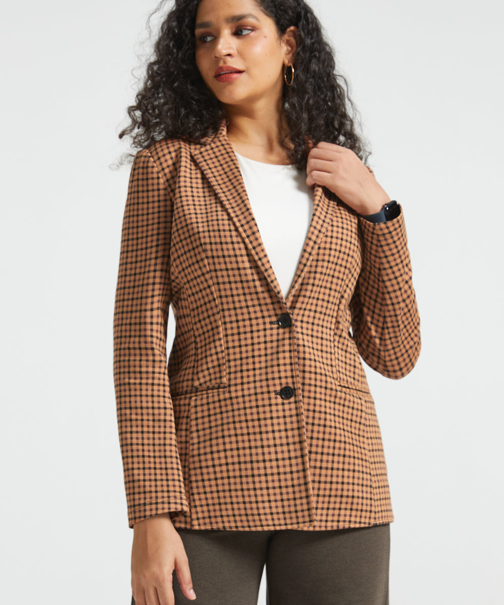 Woman wearing Camel Mini Houndstooth Classic Blazer buttoned over a white top, front three-quarter view