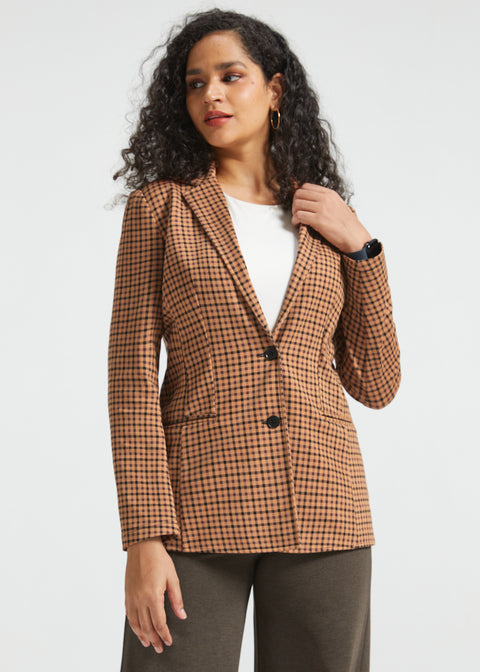 Woman wearing Camel Mini Houndstooth Classic Blazer buttoned over a white top, front three-quarter view