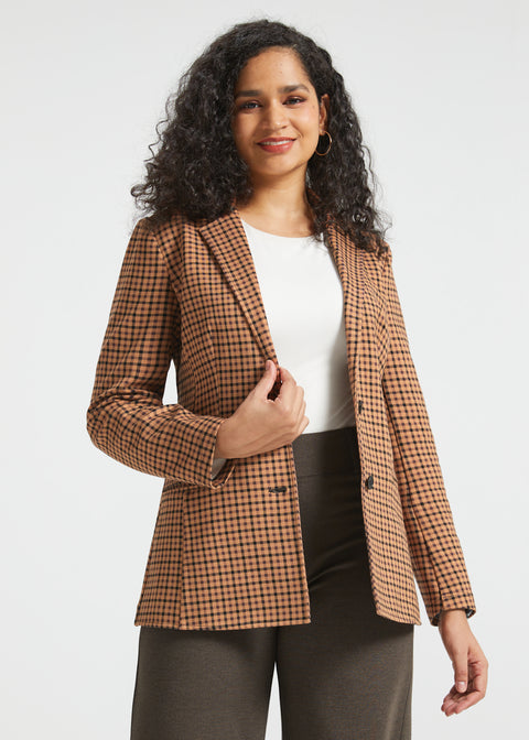 Woman wearing Camel Mini Houndstooth Classic Blazer open over a white top with brown wide-leg pants